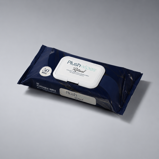 Plushwipes Ritual fragrance-free flushable wipes pouch on a soft gray background